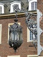 metal street lamp near the church