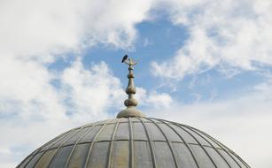 Colorful and beautiful dome with the bird, in Ä°stanbul, Turkey, under the blue sky with white clouds