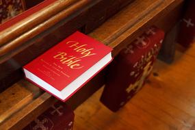 red bible book in church