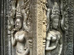 Beautiful, shiny statues in the Angkor Wat in Cambodia