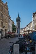 road near buildings and church