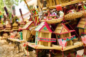 wooden asian souvenirs in blurred background