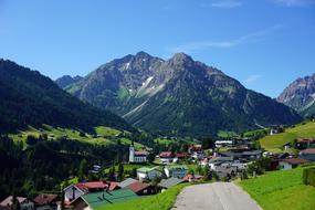a village at the foot of a mountain in austria