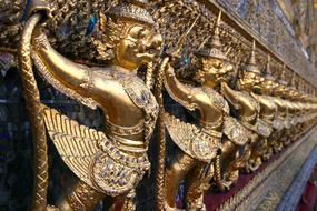 Demons gold statue