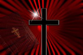 black cross on a background of red rays and bible