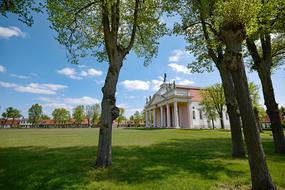 Beautiful and colorful city church, among the green plants, in Ludwigslust-Parchim, Germany