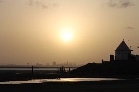 asian temple on the seashore at sunset background