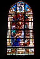 Beautiful and colorful stained glass window in the church in Sainte Anne D'auray, France