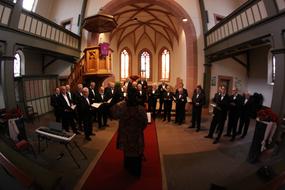 Church choir, singing in the beautiful church in Germany