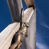 metal cross with crucified jesus christ