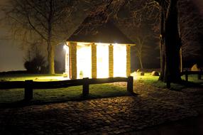 illuminated chapel at night