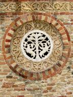 Beautiful and colorful brick pattern with the ornaments, on the church