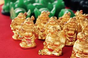 golden buddha figurines as souvenirs