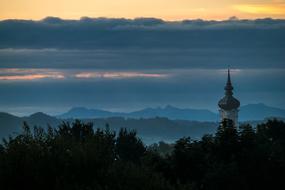 spire and forest in alpine fog, Bavaria