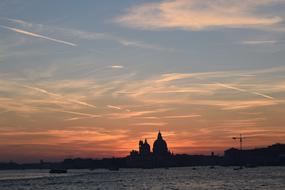 Beautiful landscape of Venice, Italy, with the silhouettes, at colorful and beautiful sunset