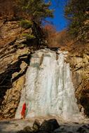 Theravada Buddhism Freezing Fall and red dreess person