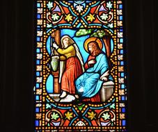 Beautiful and colorful stained glass window in the Cathedral of Dol De Bretagne, France