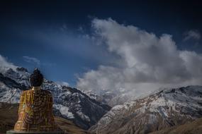 Gautama statue in picturesque mountains