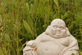 Fat Buddha Statue green grass