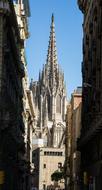 Beautiful old cathedral, among the houses in Barcelona, Spain