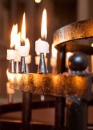 bright candle flame in the interior of the church close-up