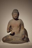 stone buddha sculpture in museum