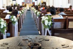 wedding ceremony in singapore church in blurred background