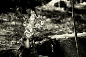 Ganesha God Religion statue black and white