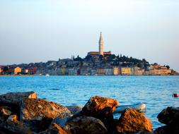 distant view of the church by the sea at dusk