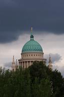 Church Potsdam Clouds and green roof
