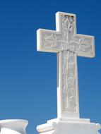 photo of white stone cross