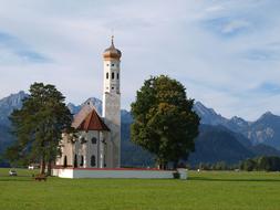 landscape of St'Coloman Church on meadow