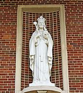 Christ Statue white red wall