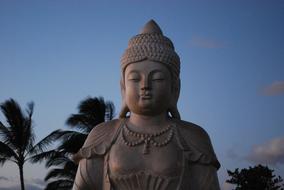 Buddha Hawaii Statue and palms