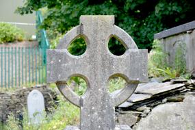Celtic stone Cross on cemetery, ireland
