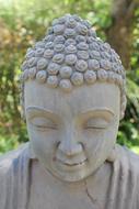 Eastern Buddhism face statue