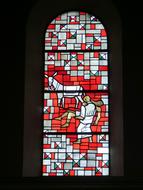 church window with red stained glass