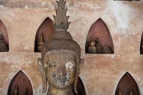 Buddha statue and building in Vientiane, Laos