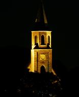 Church Steeple Illuminated at Night