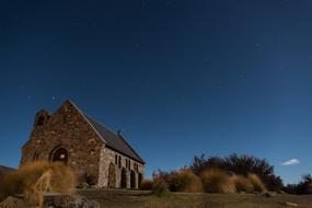 stone church in new zealand at night