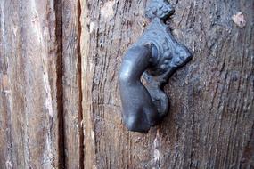 hand with stone, vintage cast iron Doorknocker