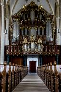 Beautiful and colorful church with the benches