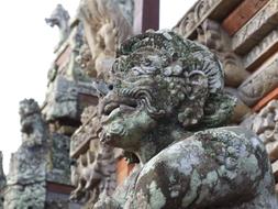 sculpture on a temple building in bali