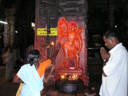 People praying in the temple in Madurai, India