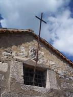 Cross on stone Church