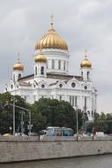 the road near the orthodox church with golden domes in Moscow