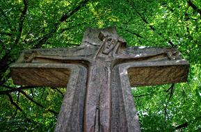 wooden cross with the image of jesus close-up