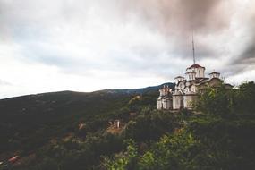 Beautiful and colorful landscape of Highland, with church, under the sky with clouds