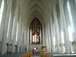 people in the church near the benches