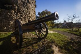 cannon near the stone tower